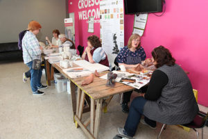 2017 Student Demonstrators speaking to visitors in the Arts Centre.